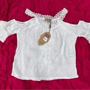 Beautiful eggshell summer top. Cold shoulder. New with tags. 100% rayon.